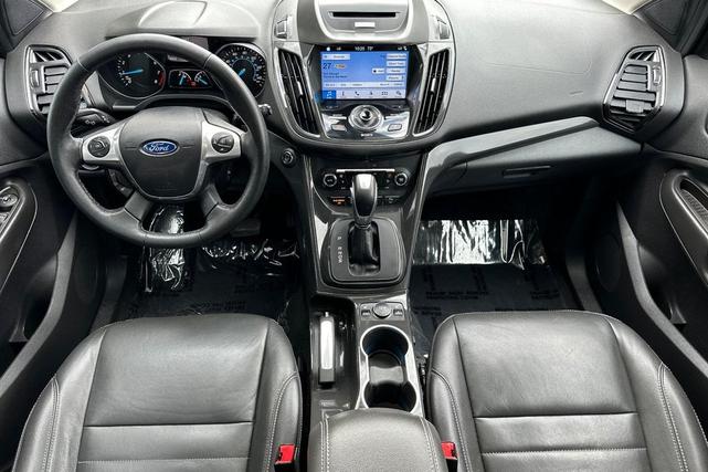 Photo of 2016 Ingot Silver Ford Escape