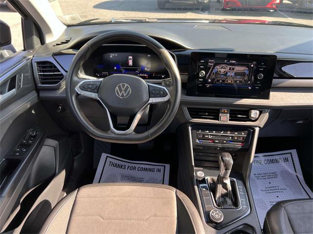 Photo of 2025 Deep Black Volkswagen Taos
