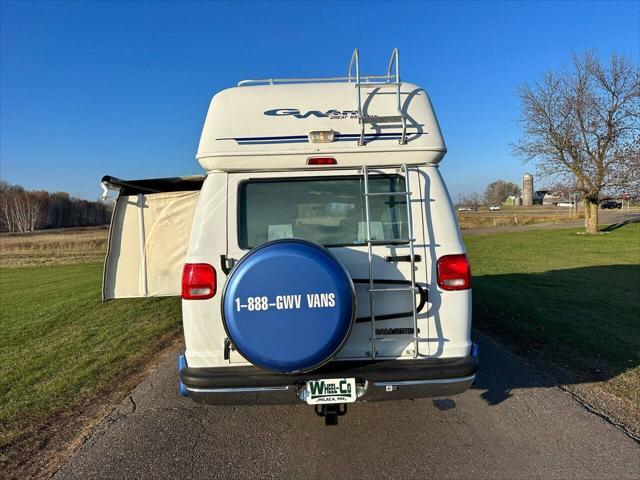 Photo of 2003 White Dodge Ram Van