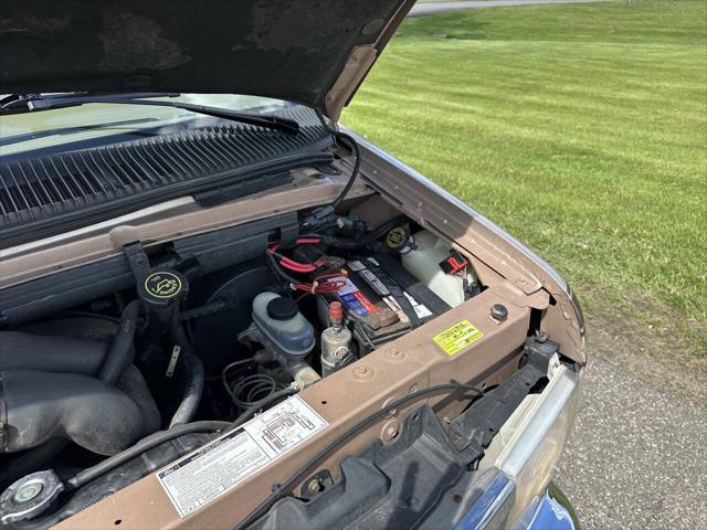 Photo of 1992 Tan Ford E150