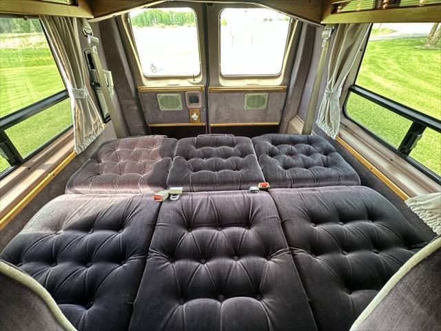 Photo of 1992 Tan Ford E150