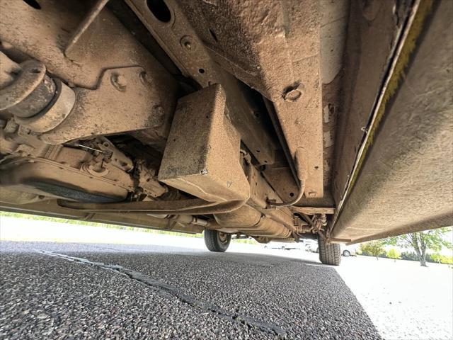 Photo of 1992 Tan Ford E150