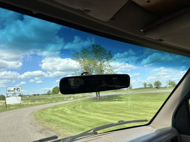 Photo of 1992 Tan Ford E150