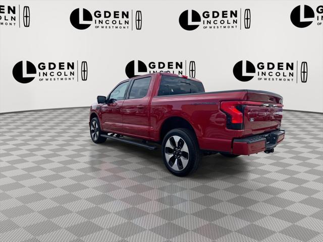 Photo of 2024 Red Metallic Ford F-150 Lightning