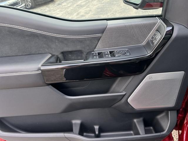 Photo of 2024 Red Metallic Ford F-150 Lightning