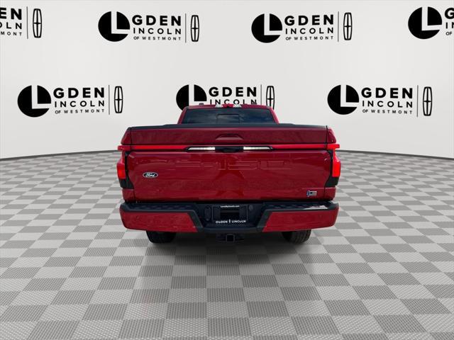 Photo of 2024 Red Metallic Ford F-150 Lightning