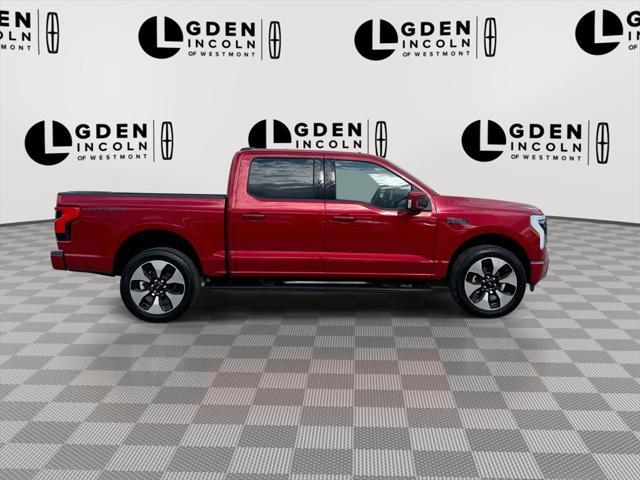 Photo of 2024 Red Metallic Ford F-150 Lightning