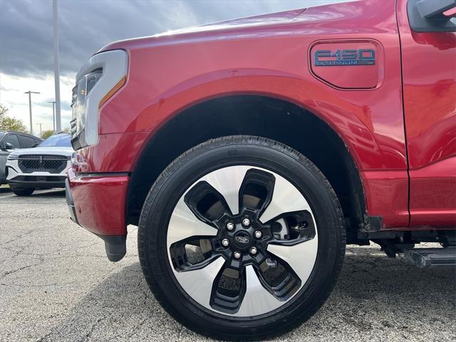 Photo of 2024 Red Metallic Ford F-150 Lightning