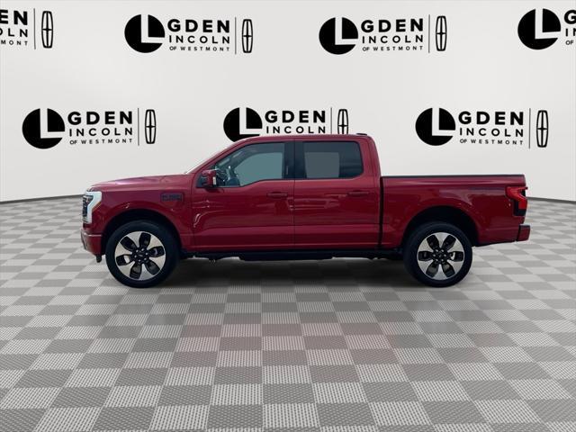 Photo of 2024 Red Metallic Ford F-150 Lightning