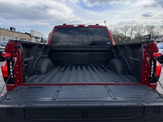 Photo of 2024 Red Metallic Ford F-150 Lightning