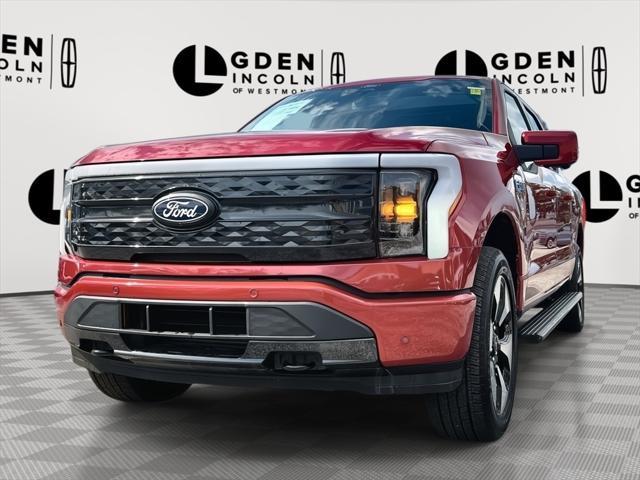 Photo of 2024 Red Metallic Ford F-150 Lightning