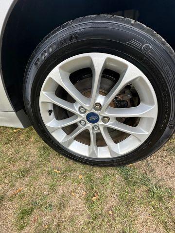 Photo of 2019 Ingot Silver Metallic Ford Fusion Hybrid