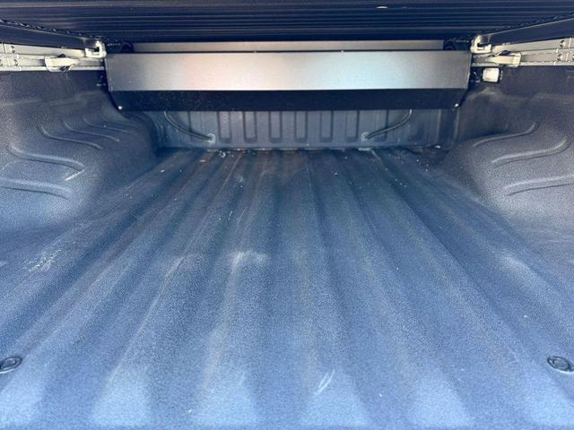 Photo of 2025 Boulder Gray Pearl Nissan Frontier
