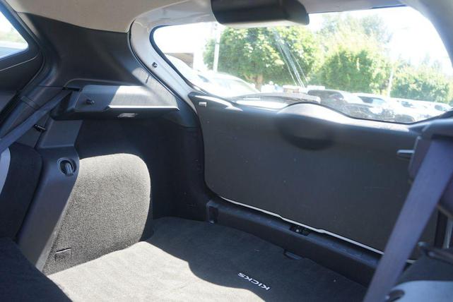 Photo of 2023 Aspen White Tricoat/Super Black Nissan Kicks