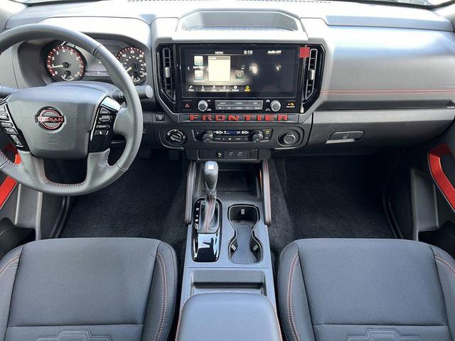 Photo of 2025 Glacier White Nissan Frontier