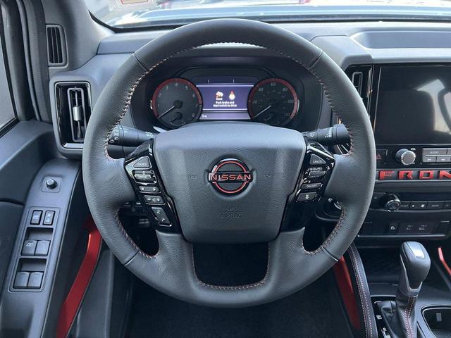 Photo of 2025 Boulder Gray Pearl Nissan Frontier