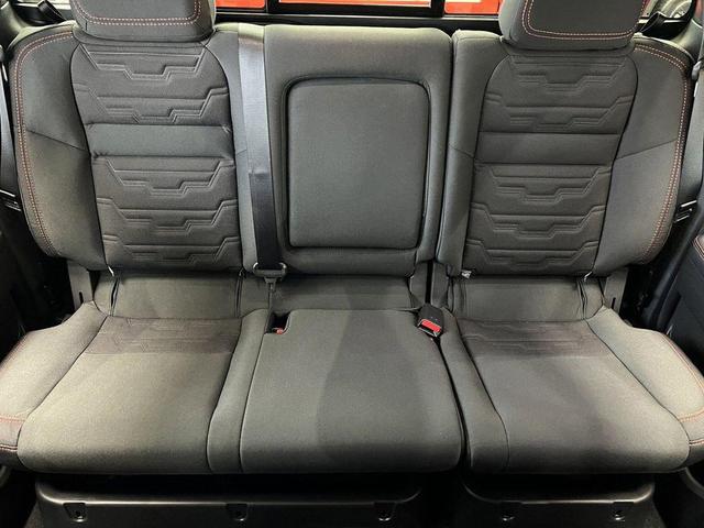 Photo of 2025 Afterburn Orange Nissan Frontier