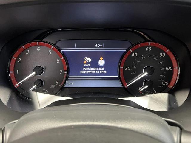 Photo of 2025 Afterburn Orange Nissan Frontier