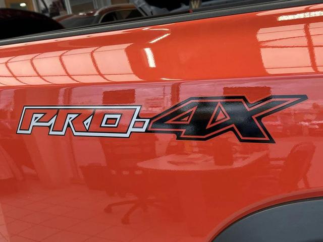 Photo of 2025 Afterburn Orange Nissan Frontier