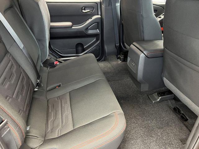 Photo of 2025 Afterburn Orange Nissan Frontier