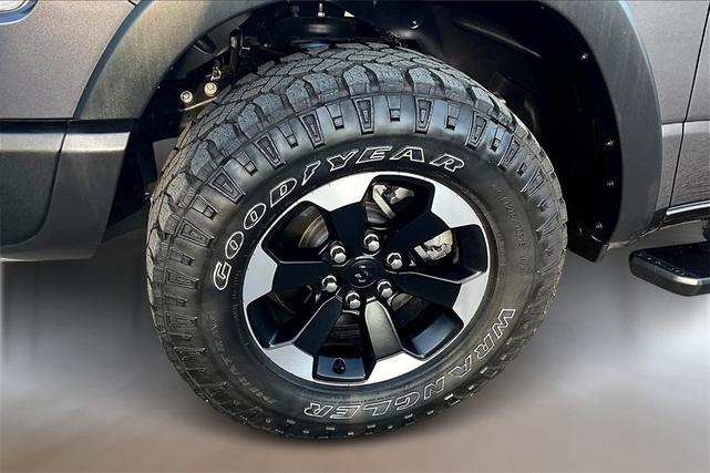 Photo of 2024 Granite Crystal Clearcoat Metallic RAM 1500
