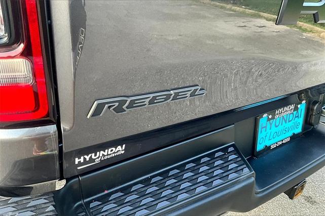 Photo of 2024 Granite Crystal Clearcoat Metallic RAM 1500