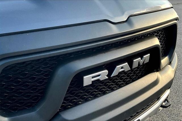 Photo of 2024 Granite Crystal Clearcoat Metallic RAM 1500
