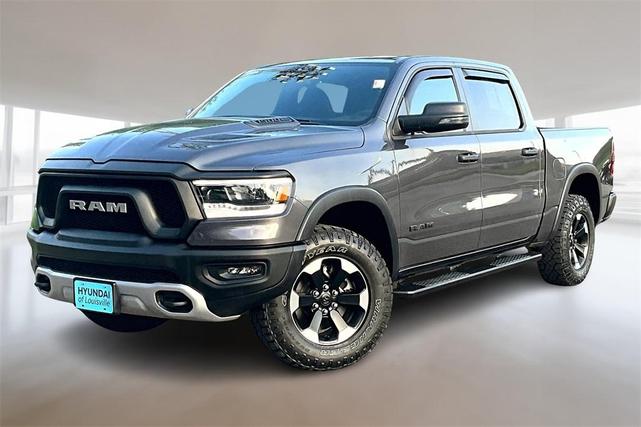 Photo of 2024 Granite Crystal Clearcoat Metallic RAM 1500