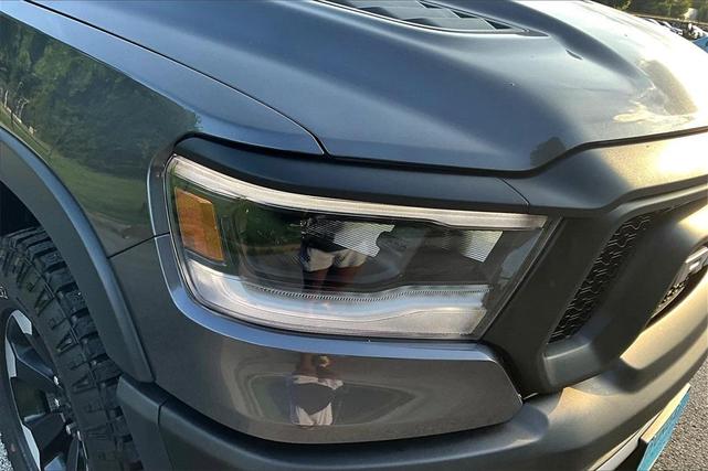 Photo of 2024 Granite Crystal Clearcoat Metallic RAM 1500