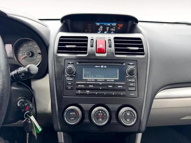 Photo of 2014 Venetian Red Pearl Subaru Forester