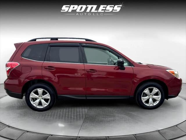 Photo of 2014 Venetian Red Pearl Subaru Forester