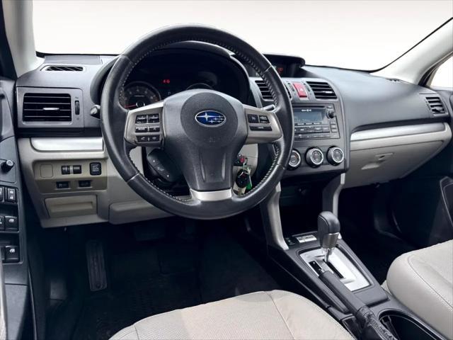 Photo of 2014 Venetian Red Pearl Subaru Forester