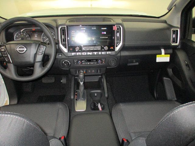 Photo of 2025 Glacier White Nissan Frontier
