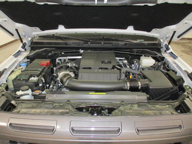 Photo of 2025 Glacier White Nissan Frontier