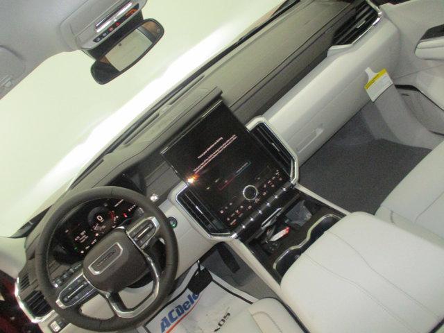 Photo of 2024 Volcanic Red Tintcoat GMC Acadia