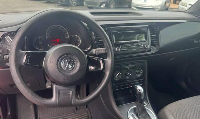 Photo of 2013 Tornado Red Volkswagen Beetle