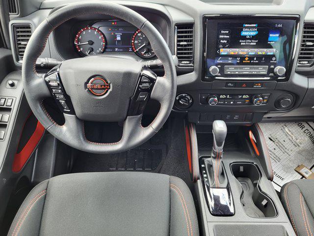 Photo of 2024 Boulder Gray Pearl Nissan Frontier