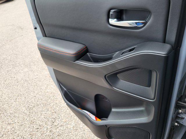 Photo of 2024 Boulder Gray Pearl Nissan Frontier