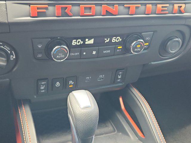 Photo of 2025 Cardinal Red Metallic Tricoat Nissan Frontier