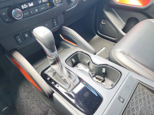 Photo of 2025 Cardinal Red Metallic Tricoat Nissan Frontier