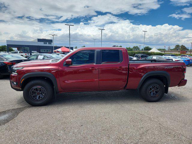 Photo of 2025 Cardinal Red Metallic Tricoat Nissan Frontier
