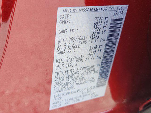 Photo of 2025 Cardinal Red Metallic Tricoat Nissan Frontier
