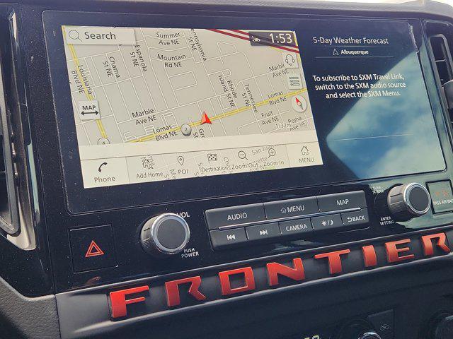 Photo of 2025 Cardinal Red Metallic Tricoat Nissan Frontier