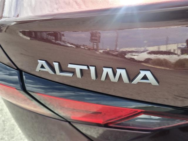 Photo of 2023 Garnet Pearl Metallic Nissan Altima