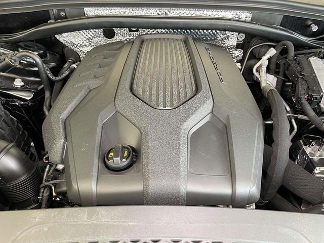 Photo of 2024 Jet Black Metallic Porsche Macan