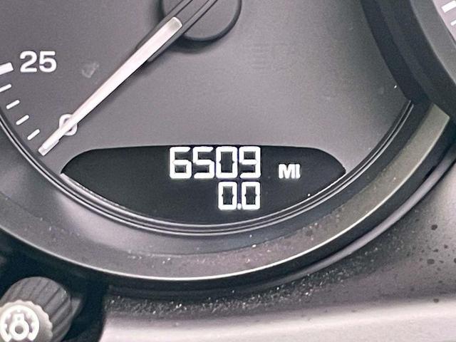 Photo of 2024 Jet Black Metallic Porsche Macan