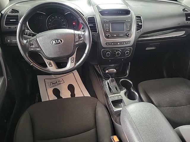 Photo of 2015 Remington Red Metallic Kia Sorento