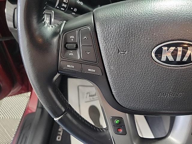 Photo of 2015 Remington Red Metallic Kia Sorento