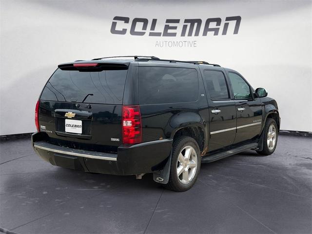 Photo of 2009 Black Chevrolet Suburban