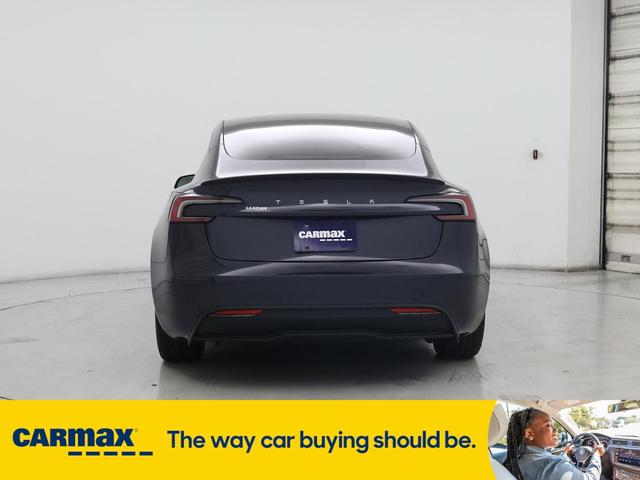 Photo of 2024 Black Tesla Model 3